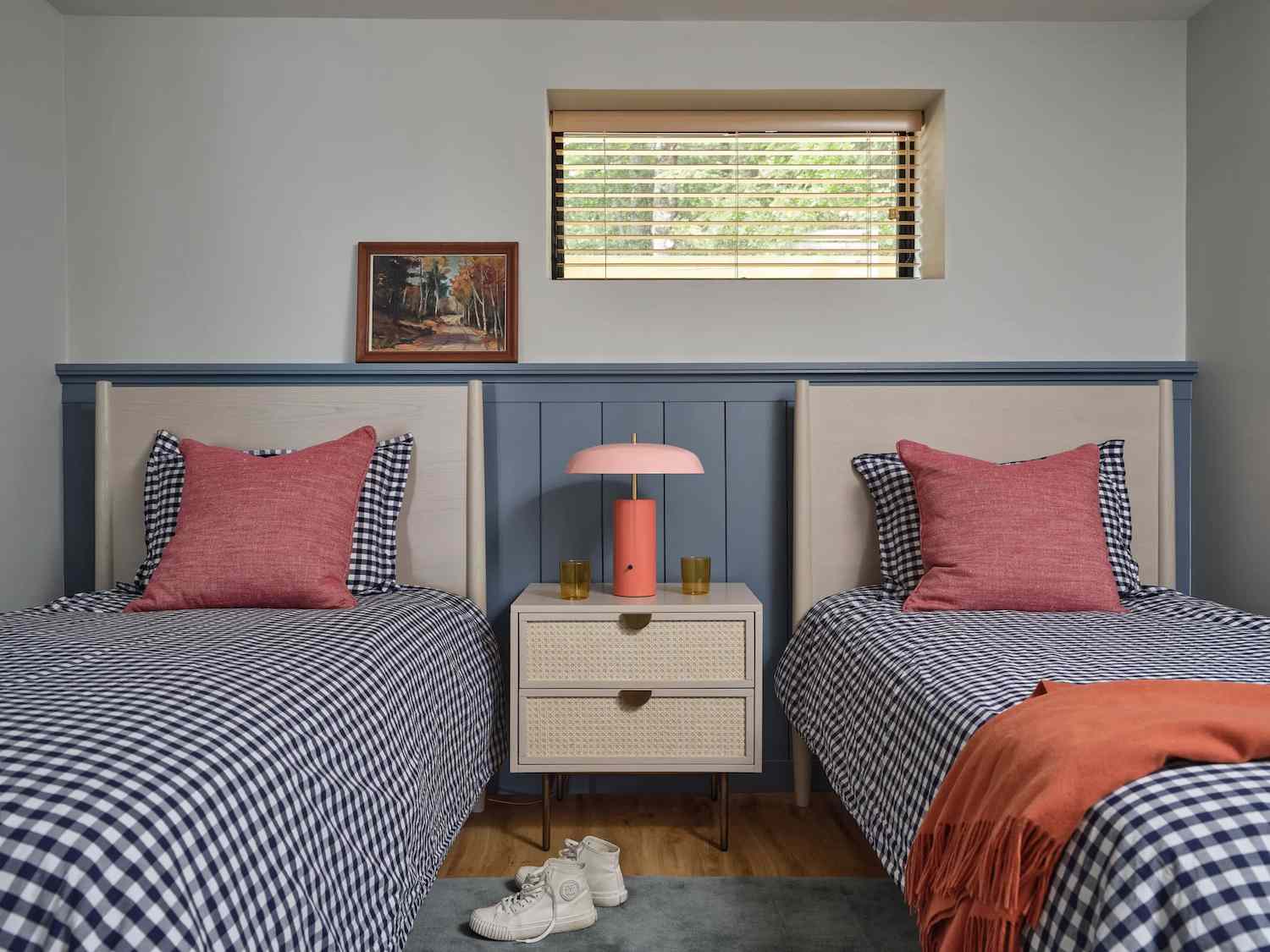 bedroom with blue wainscoting 