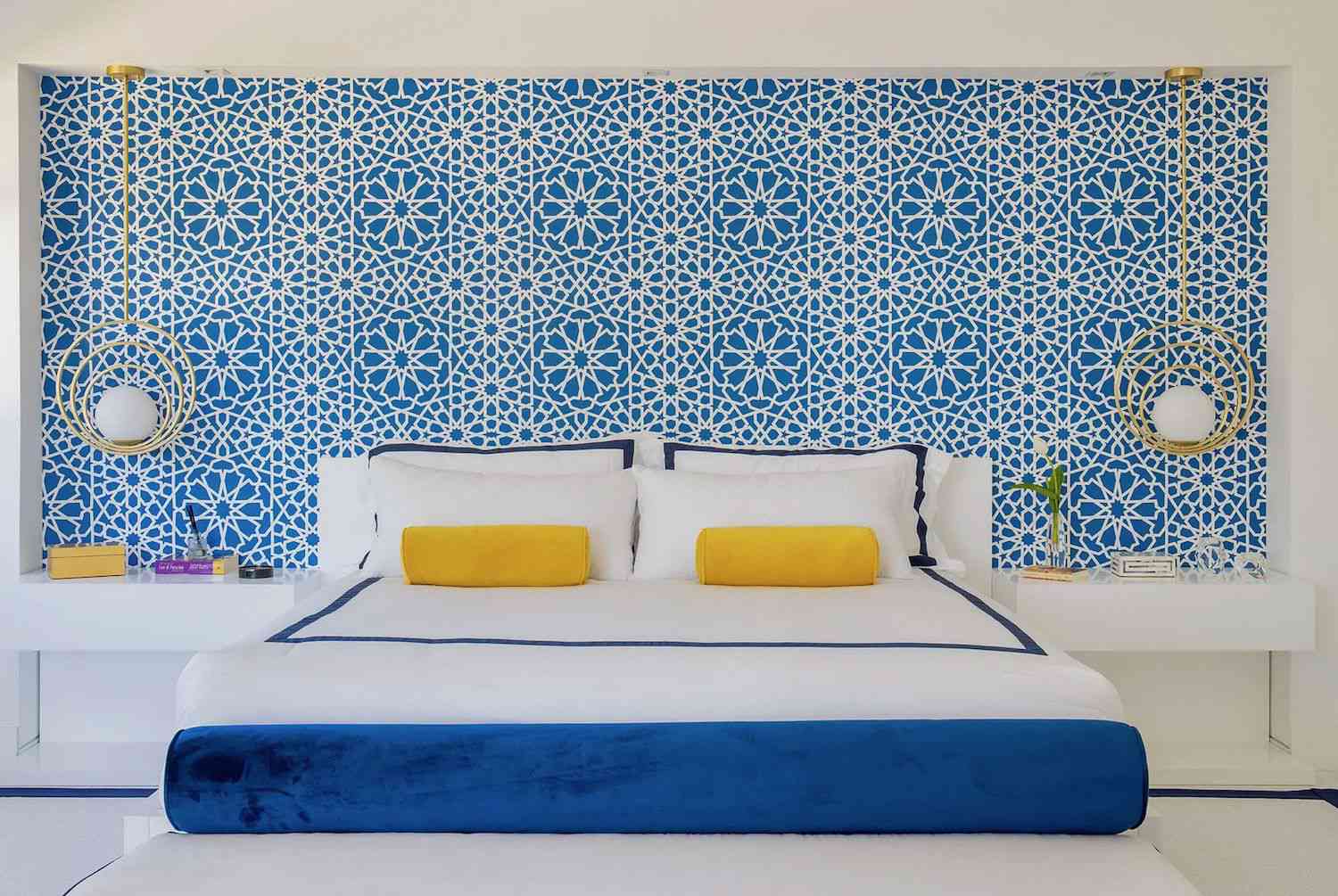 8 Designer-Approved Bedroom Decorating Tricks That Cost Less Than They Look 10 blue bedroom wallpaper