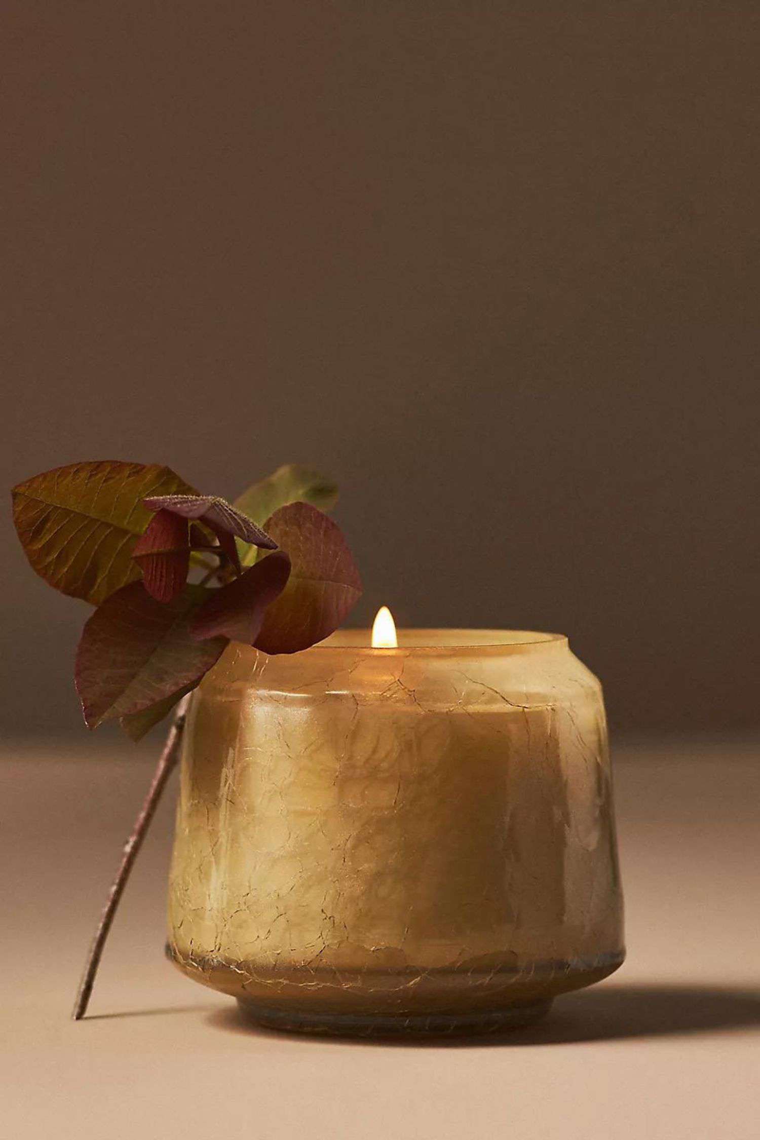 14 Herbstdekorationen von Anthropologie, die Sie nicht verpassen sollten, alle unter 20 $ 10 Eine warme, getönte Glaskerze mit Kürbis- und Vanilleduft in Knisteroptik