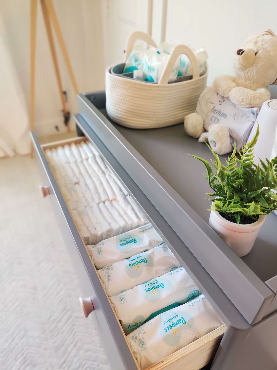 organize nursery dresser