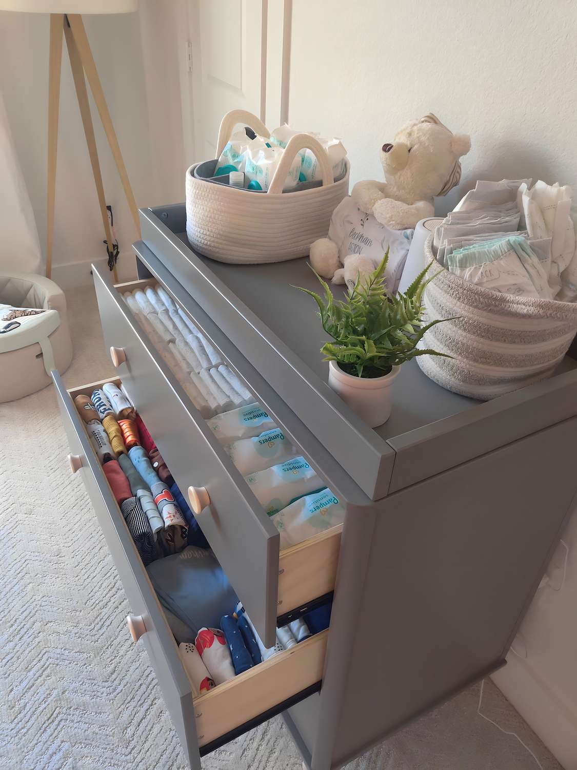 organize nursery dresser
