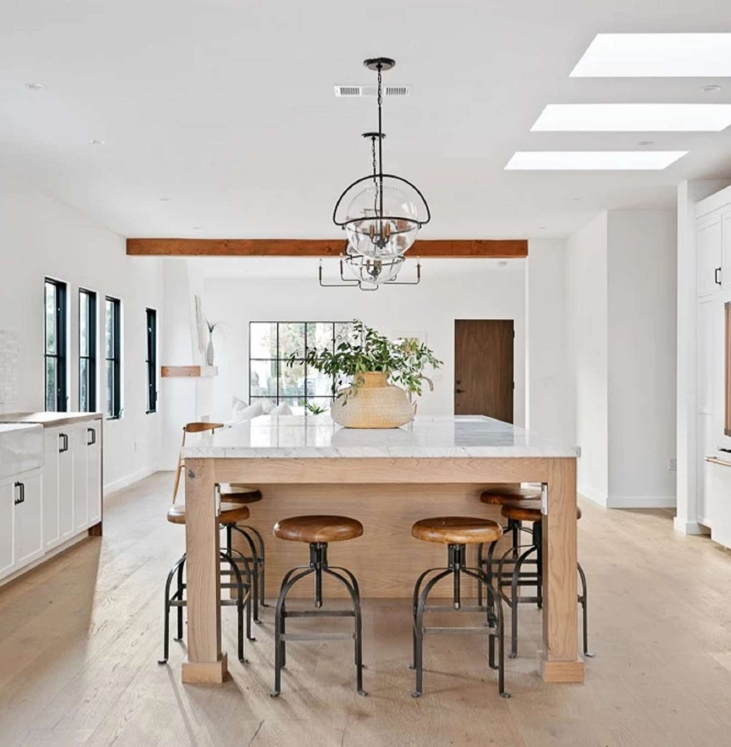 A kitchen island that seats six people