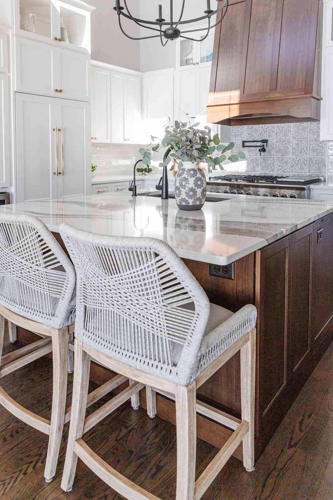 A kitchen island with an outlet