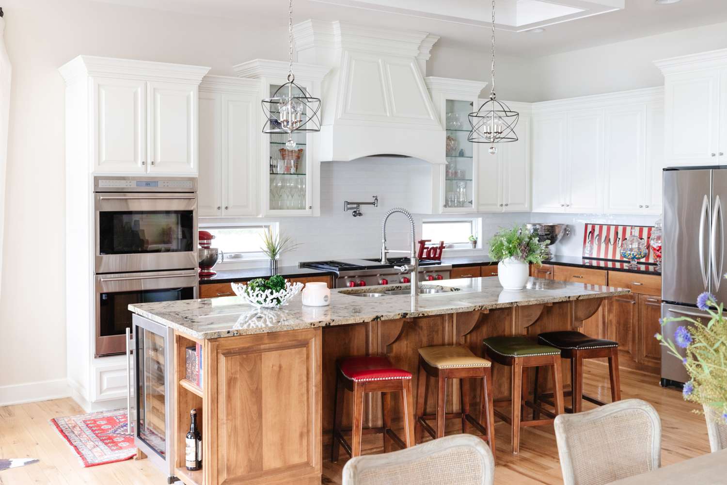 A large kitchen island with a wine cooler