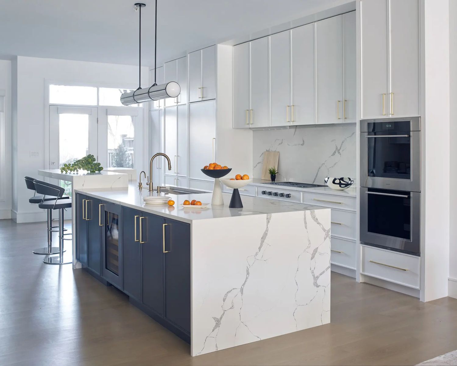 blue kitchen island with wine fridge