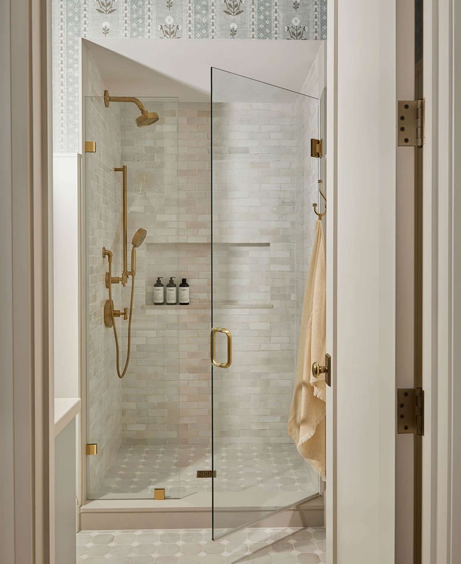 5 Things Designers Immediately Notice About a Bad Bathroom Layout 4 Ashley Montgomery Design bathroom with unframed glass door shower.