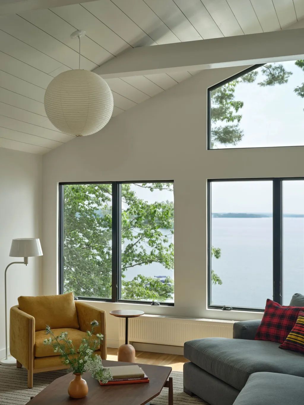 48 Small Sunroom Ideas for a Warm and Happy Space 66 Sunroom with white shiplap ceiling, tall windows and modern furniture