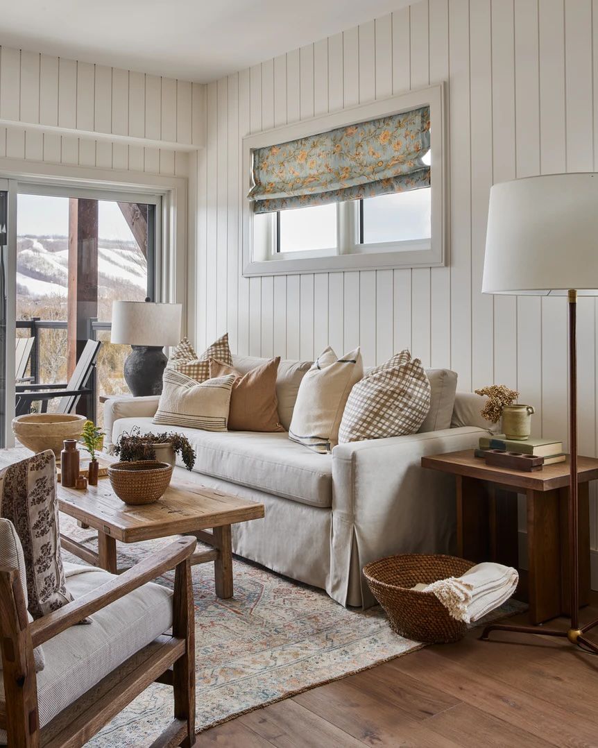 48 Small Sunroom Ideas for a Warm and Happy Space 84 Patterned roman shade in a sunroom with vertical white shiplap walls