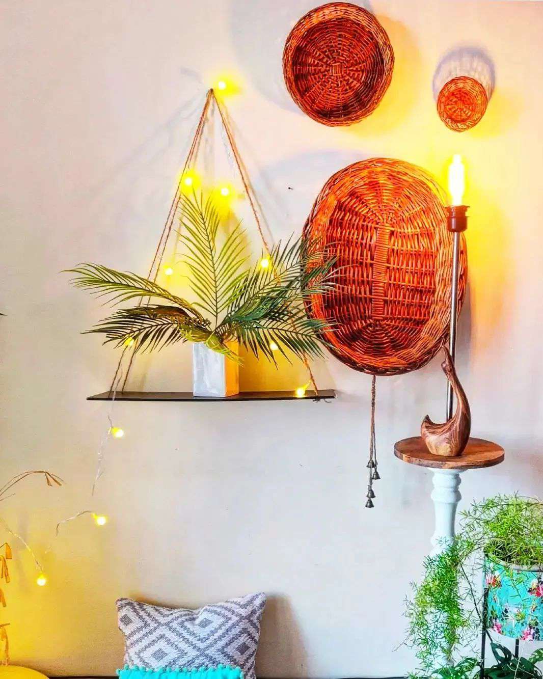 baskets and DIY plant shelf on wall