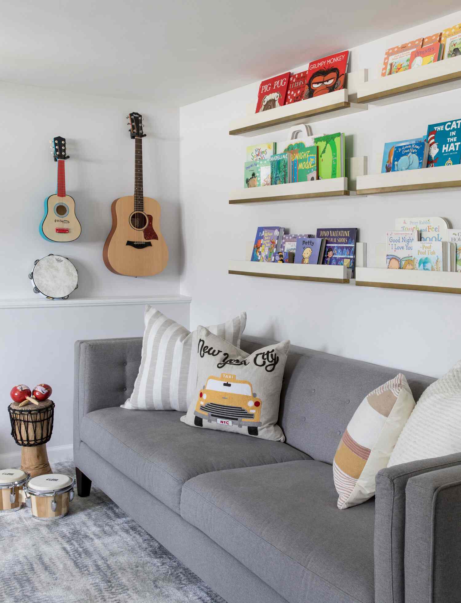 guitars and tambourine on wall
