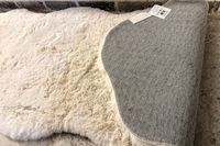 Die Teppiche USA Waverly Double Faux Sheepell Teppich gefaltet, um unten und oben zu zeigen