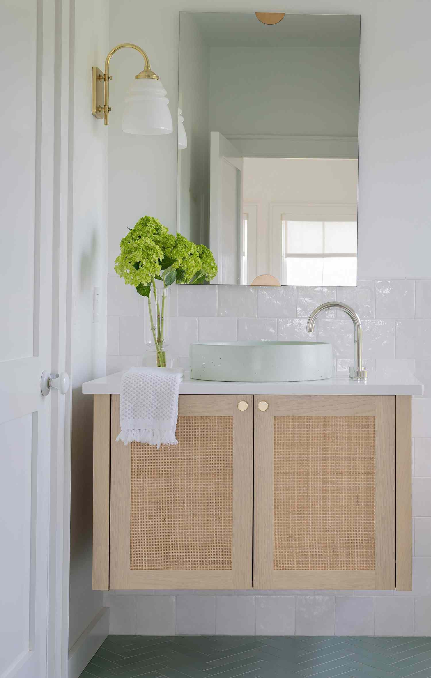 5 Things Designers Immediately Notice About a Bad Bathroom Layout 2 Desiree Burns Interiors view of vanity and basin sink from doorway.