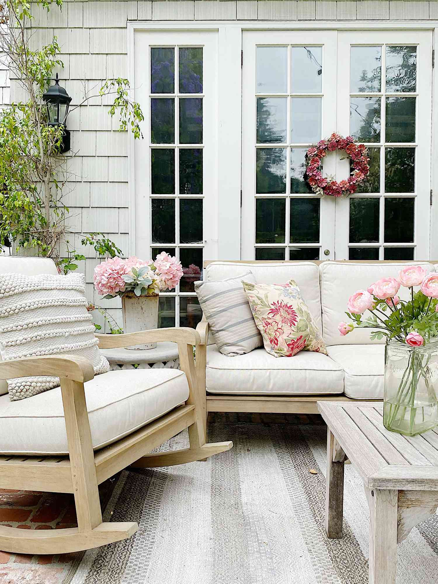 small backyard patio decorated with florals