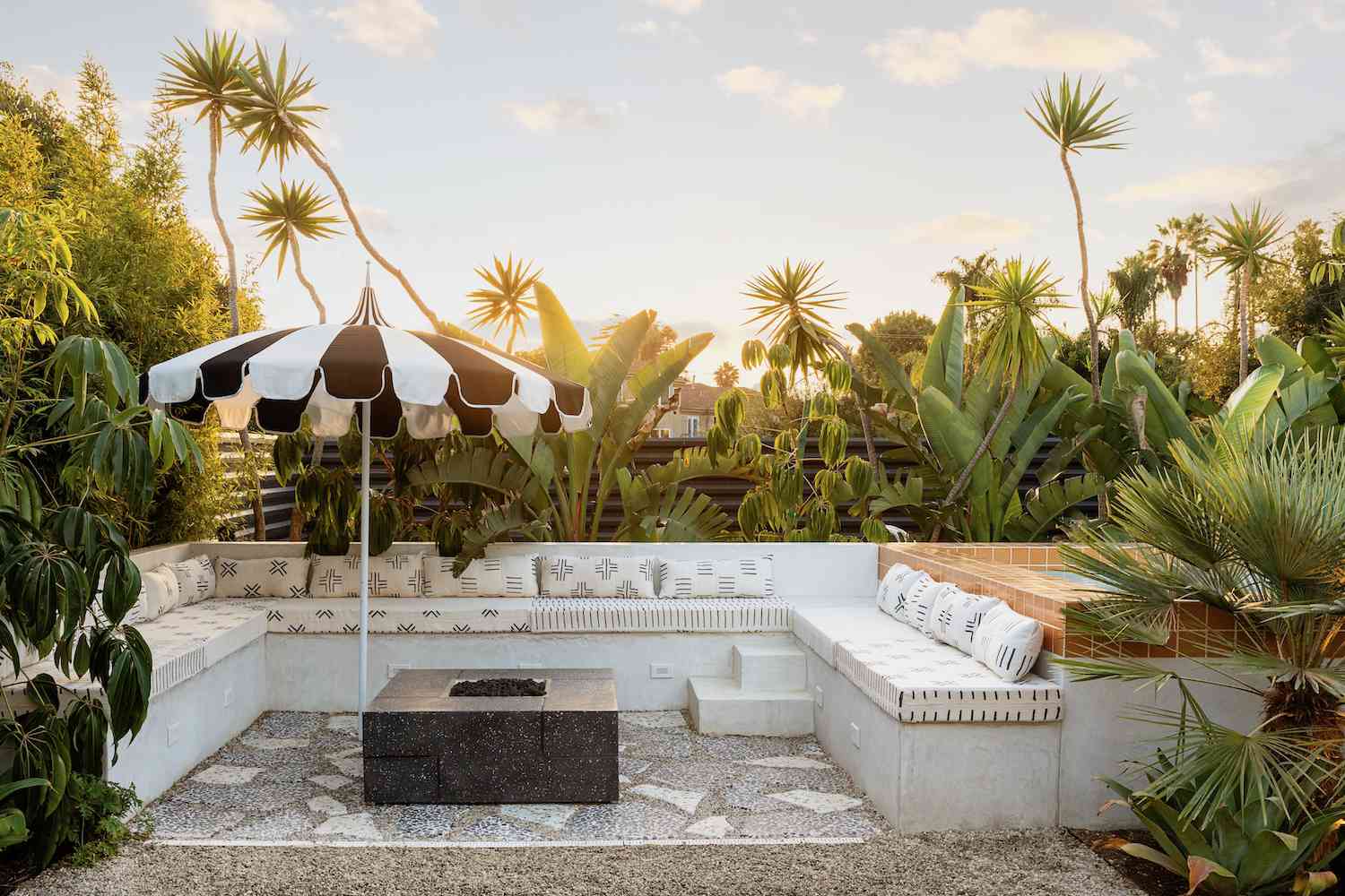 above-ground pool with fire pit area