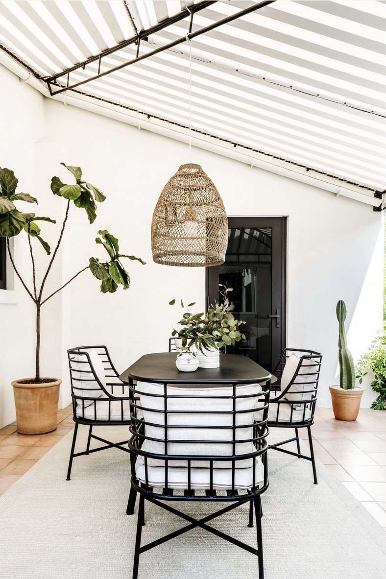 houseplants used around an outdoor dining area