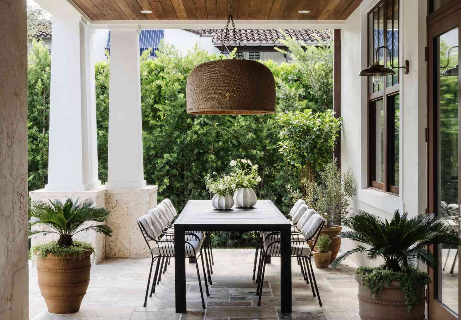 oversized lighting fixture above an outdoor table