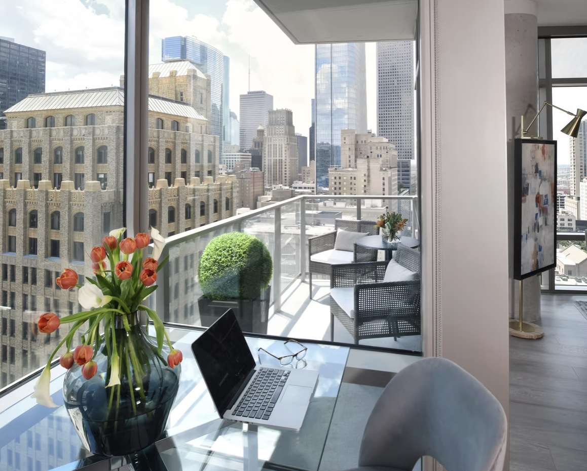 A small outdoor dining area on a balcony
