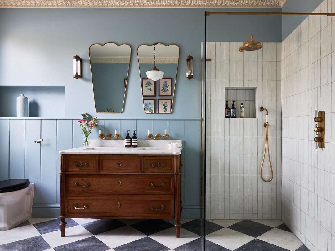 double mirrors above vanity in bathroom