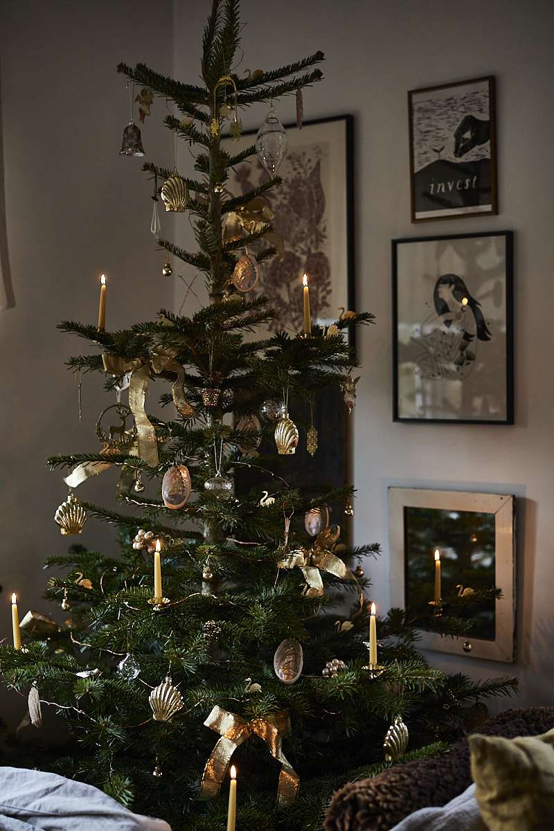 christmas tree with gold metallic ribbon