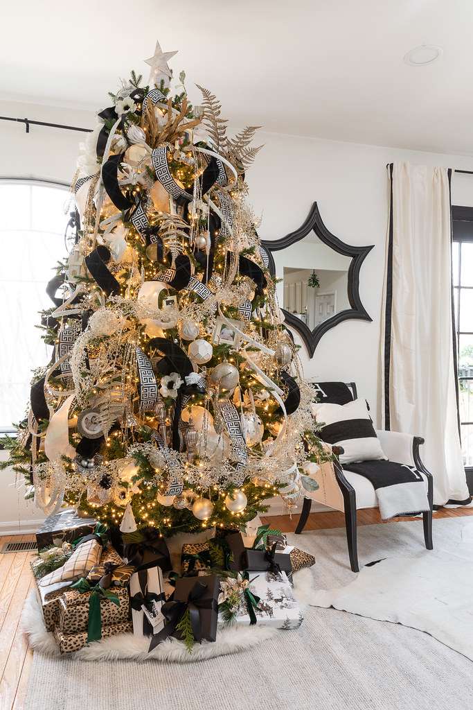 christmas tree decorated with black ribbons