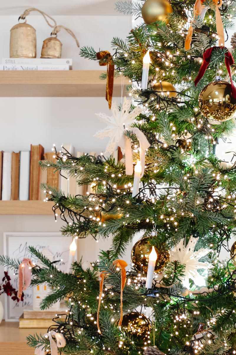 christmas tree with multicolored velvet ribbon bows