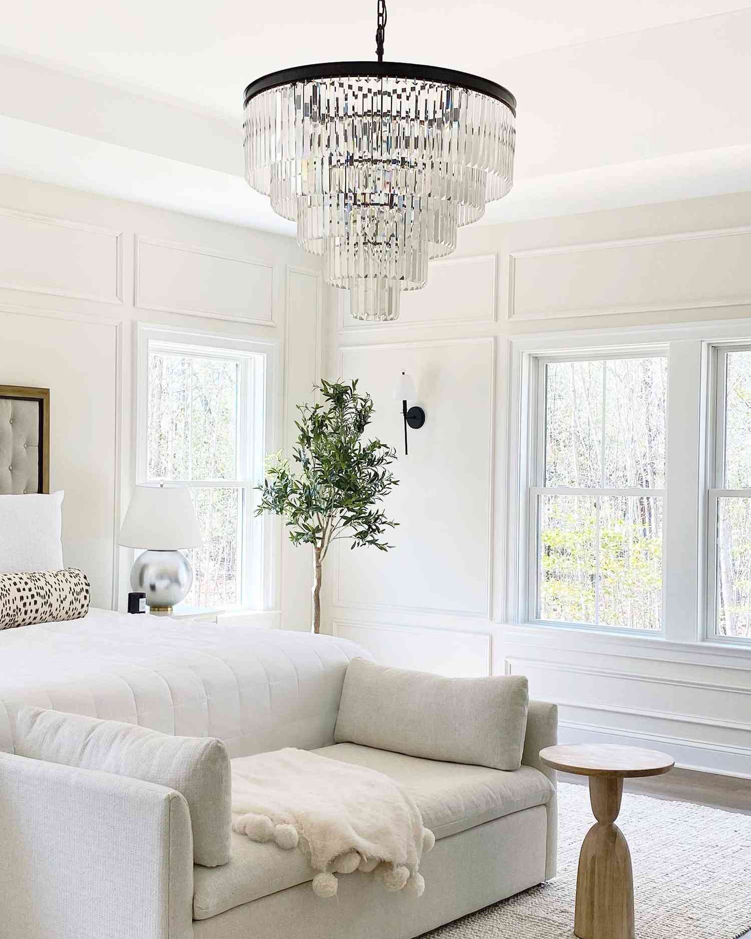 couples bedroom with potted tree