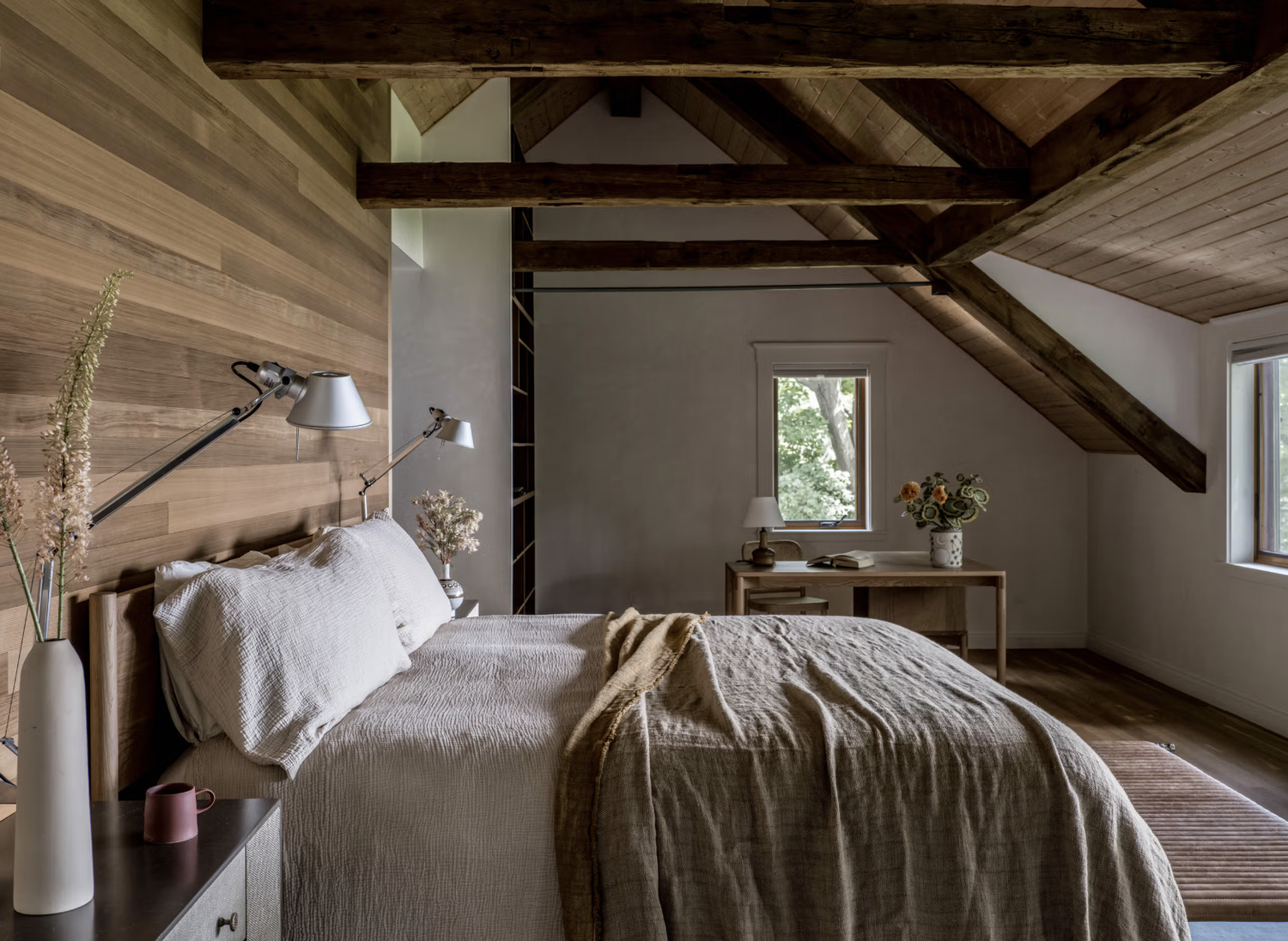 couples bedroom with natural wood accents