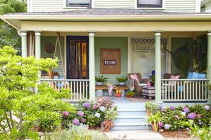 5 Common Front Yard Eyesores 6 Front view of porch with lots of decor including Welcome sign