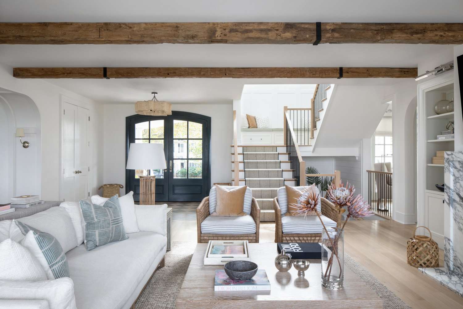 coastal living room with weathered beams