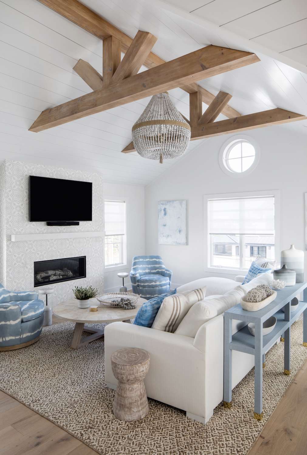coastal living room with exposed ceiling