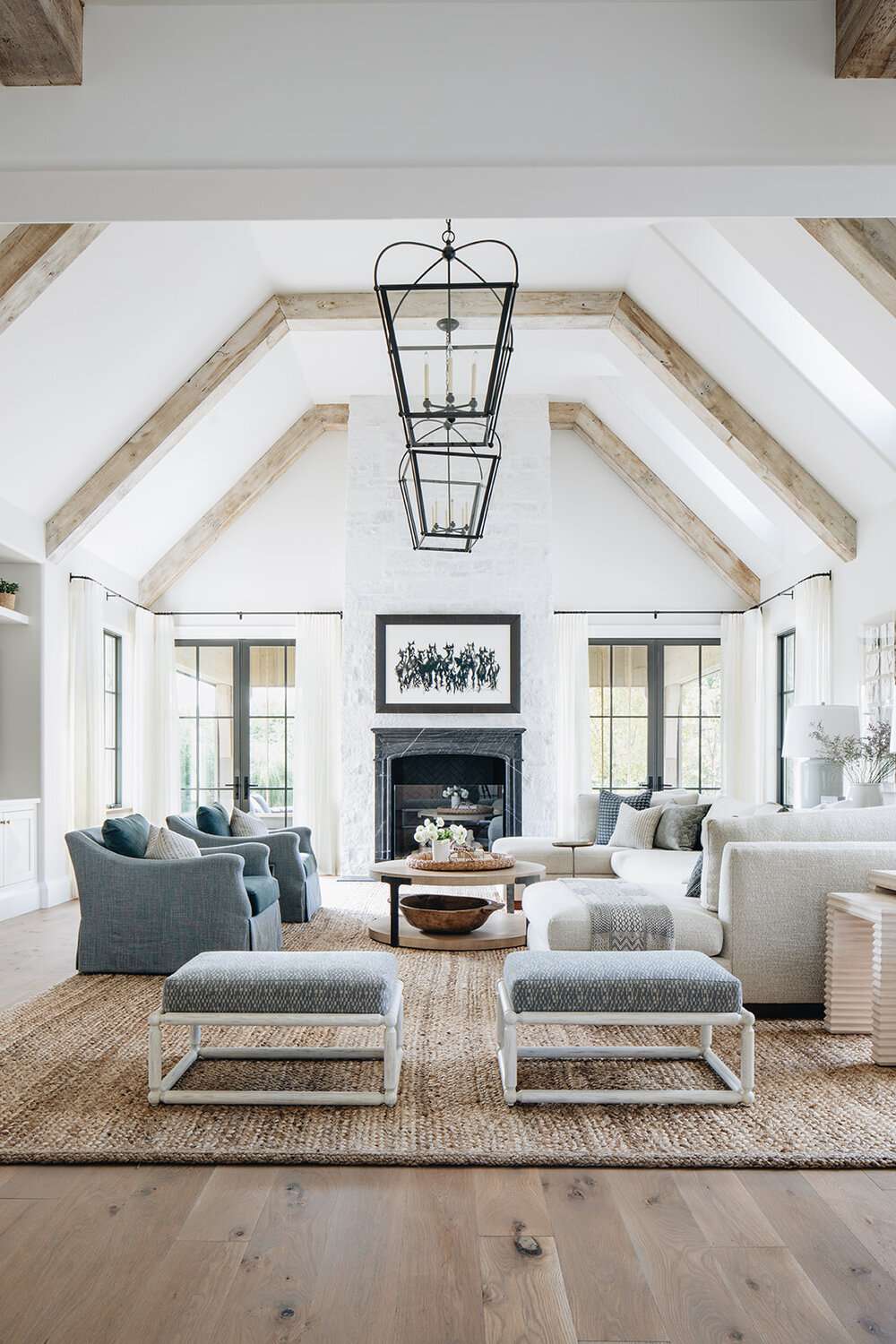 coastal living room with white brick fireplace