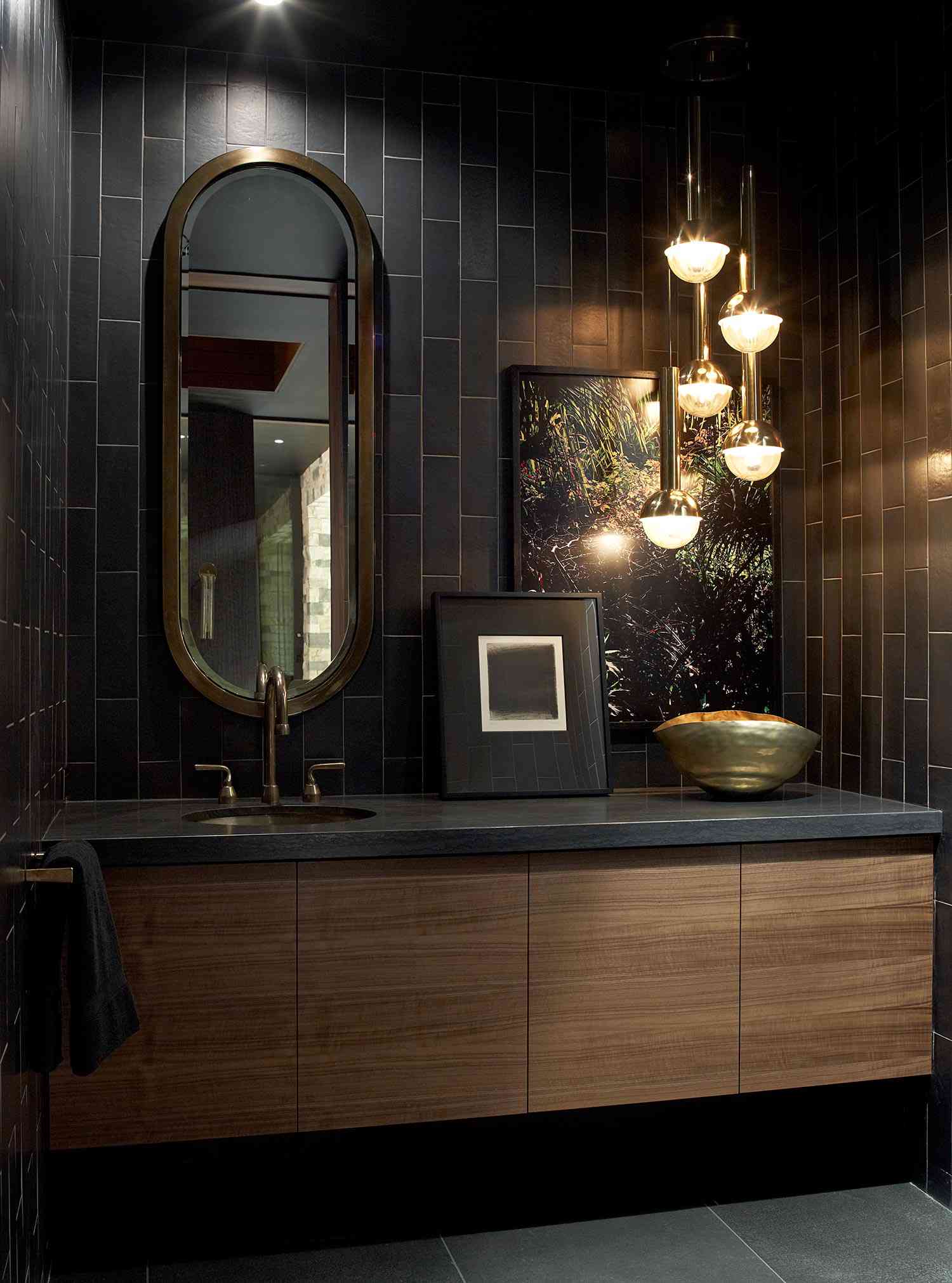 Black Bathroom With Gold Lighting
