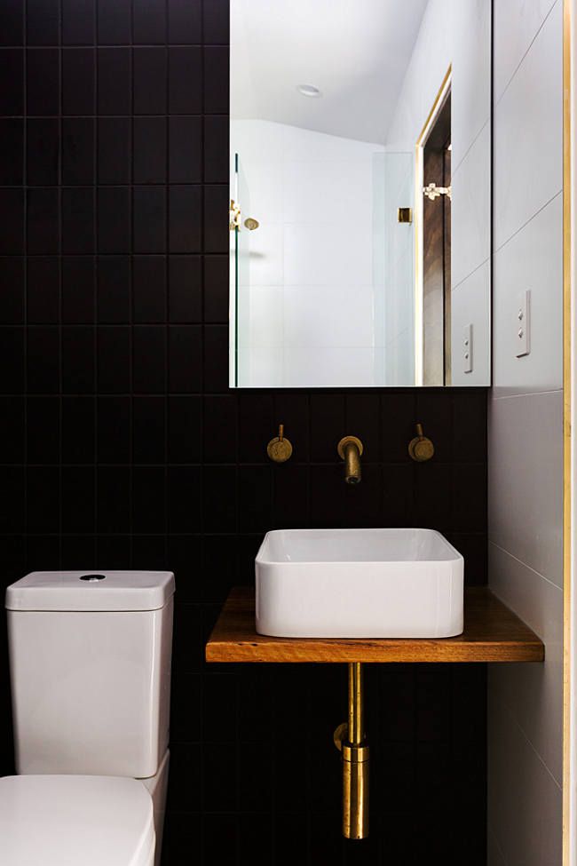 Black Bathroom With Brass Industrial Hardware