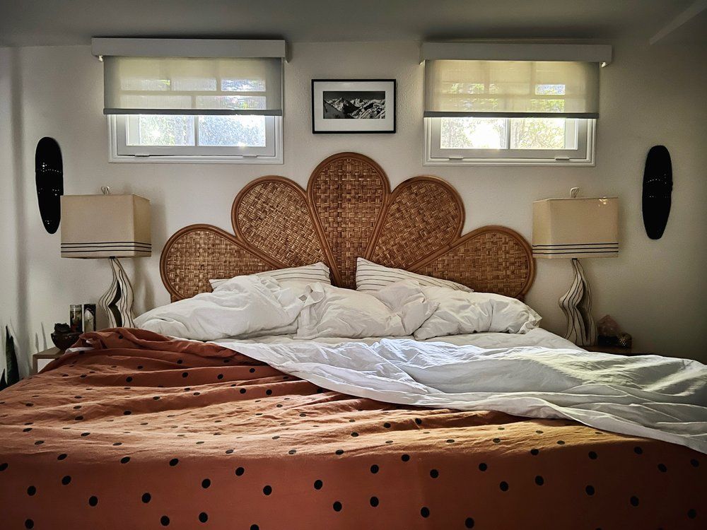 vintage headboard in couples bedroom
