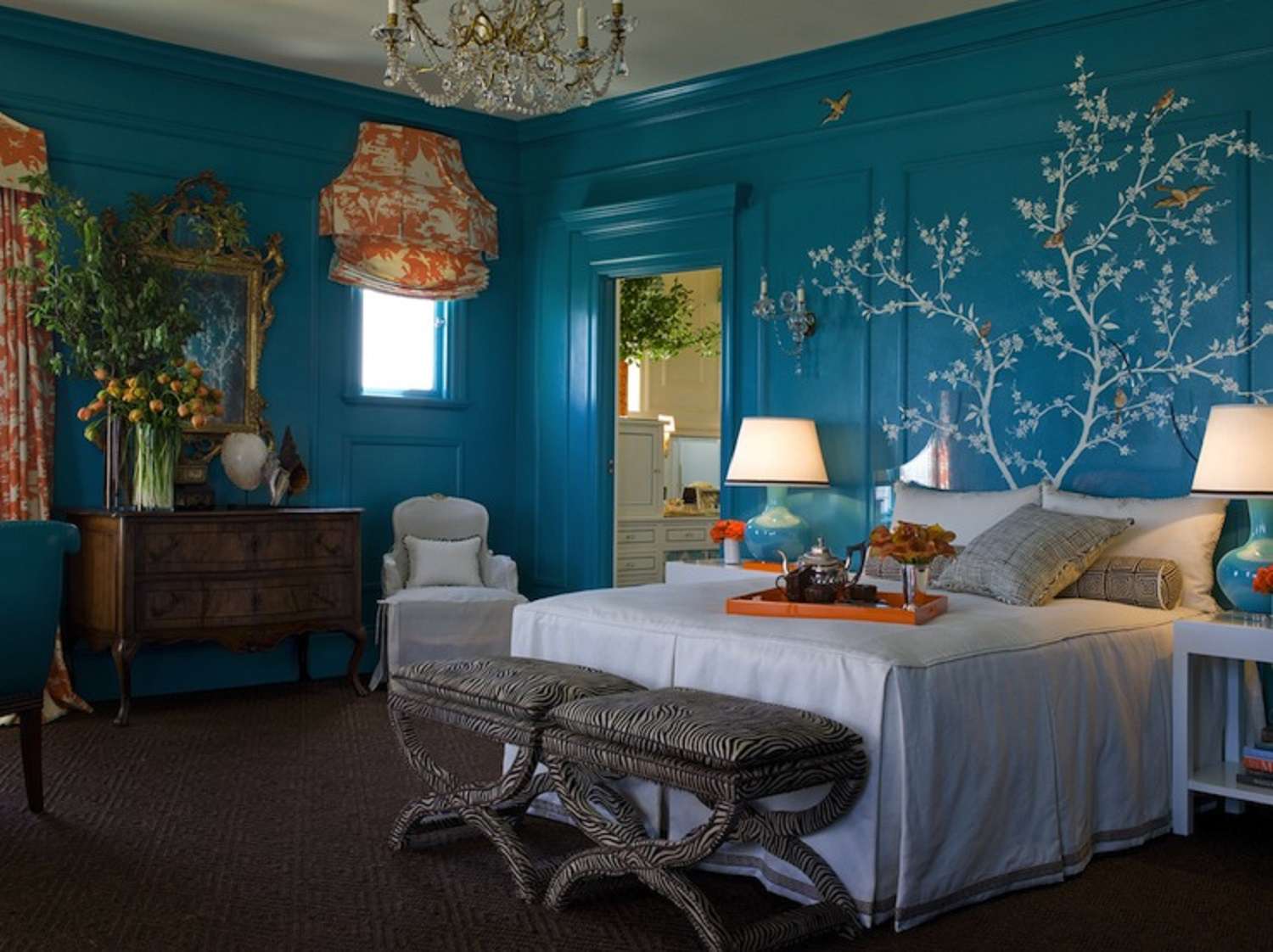 blue bedroom with orange accents