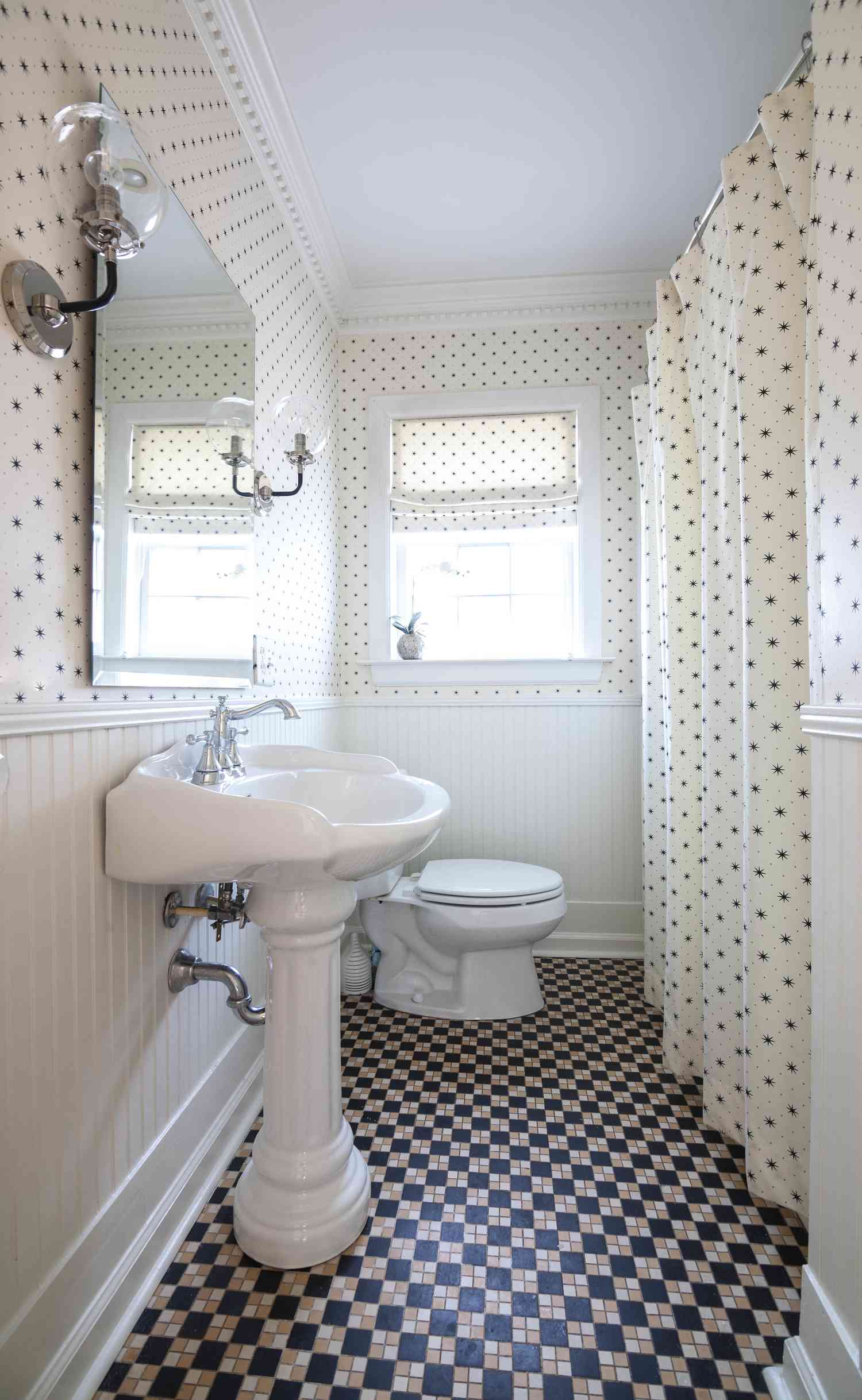 A bathroom with mixed patterns