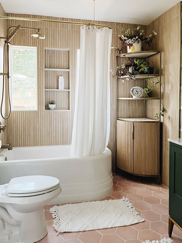 A bathroom with a wood accent wall