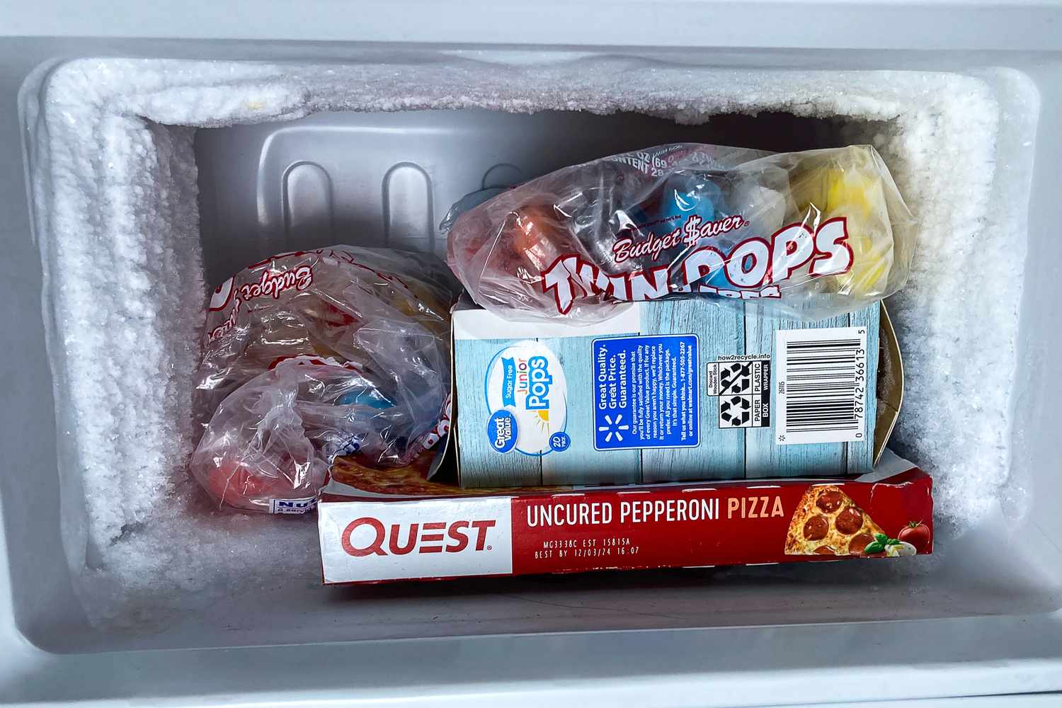 My Retro Mini Fridge Has a Freezer And Is Perfect for Dorm Rooms or Your Home Office 18 Frozen food items inside the West Bend Mini Freezer including popsicles a frozen pizza and a box of frozen goods