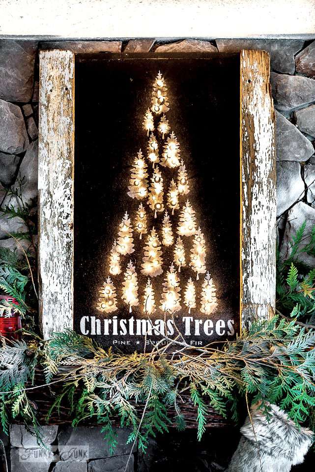 A bulletin board feature an illuminated Christmas tree