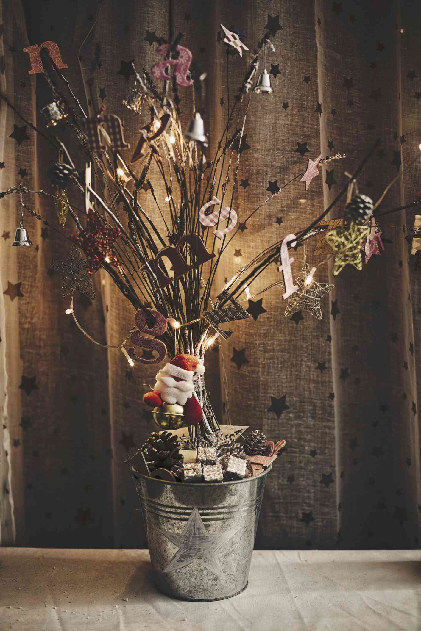 Potted branches decorated for Christmas