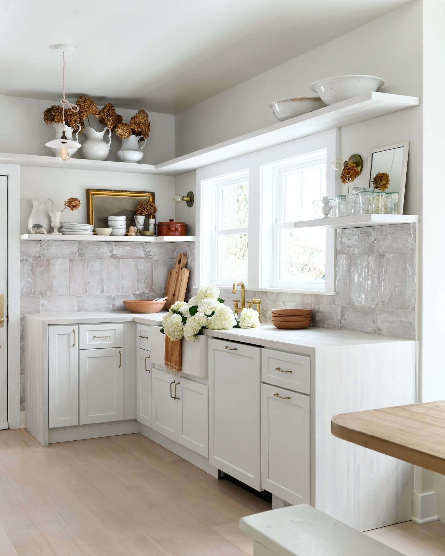 floating shelf over kitchen sink window