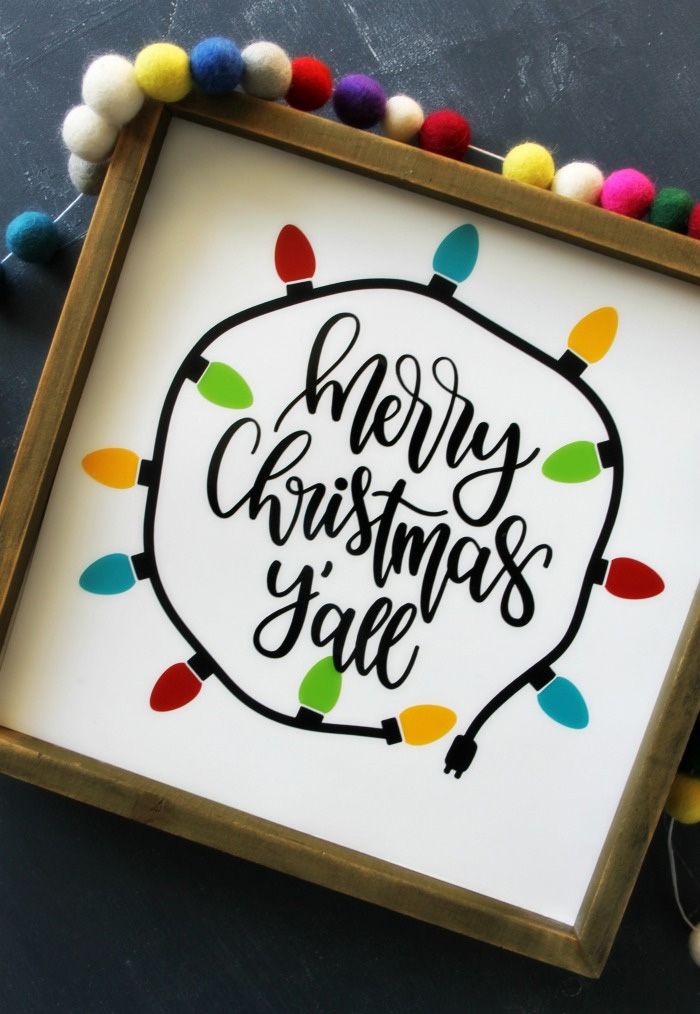 A DIY Christmas sign with cut out vinyl