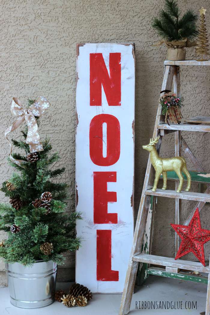 A red and white DIY Christmas sign