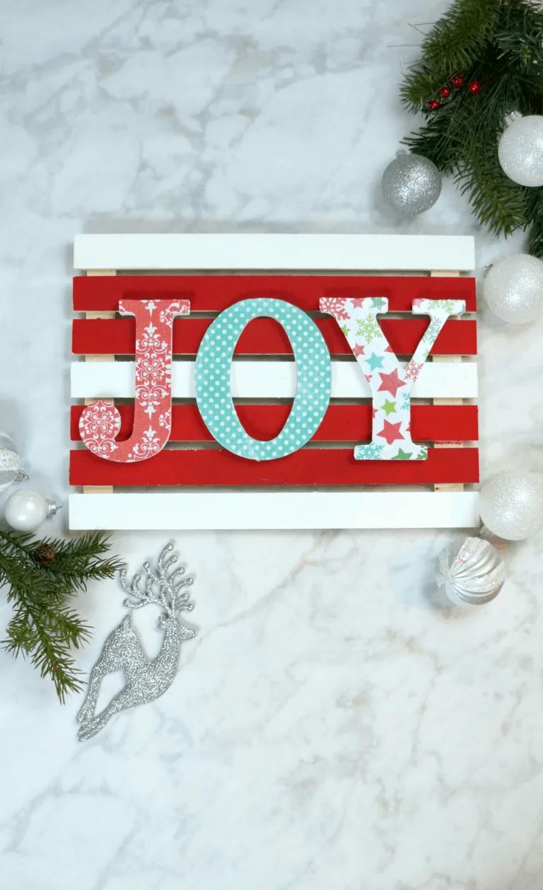 A colorful DIY Christmas sign