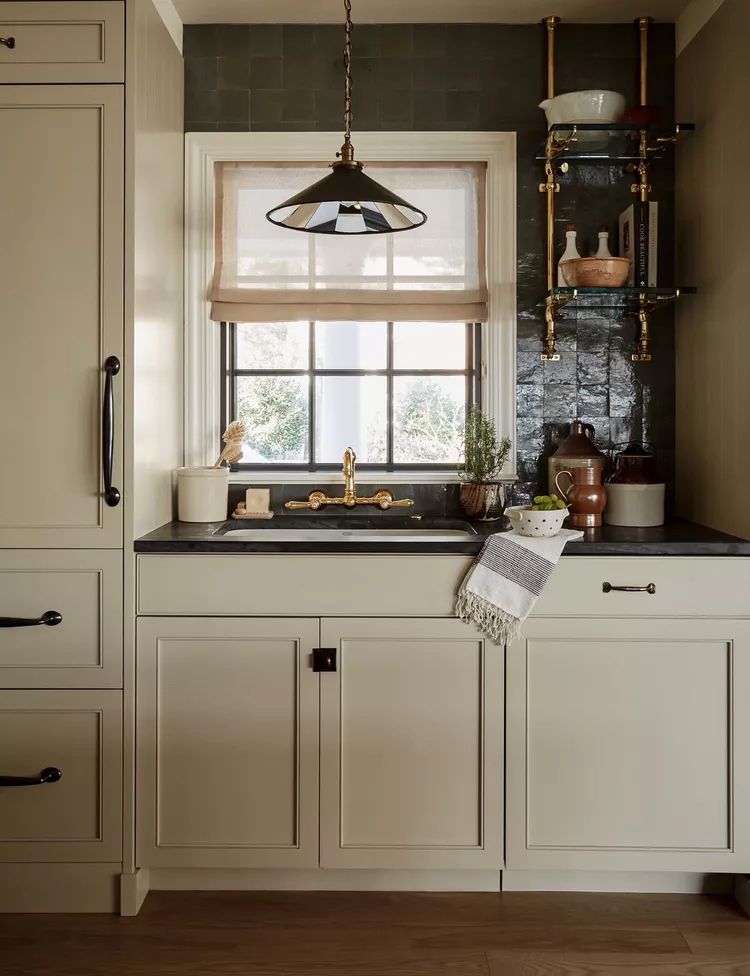 kitchen sink window with roman shade