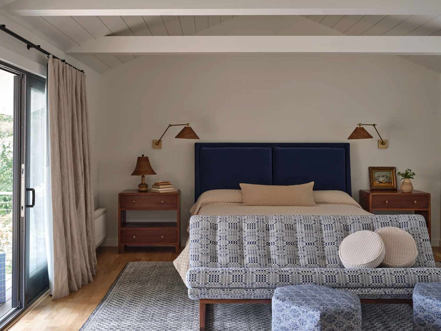 blue bedroom with mixed patterns