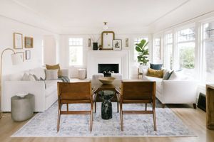 Mostly white living room with symmetrical furniture layout